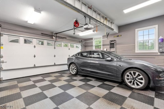 28 Sherbrook Dr, Berkeley Heights Twp, NJ 07922 - garage with a garage door opener and a wainscoted wall