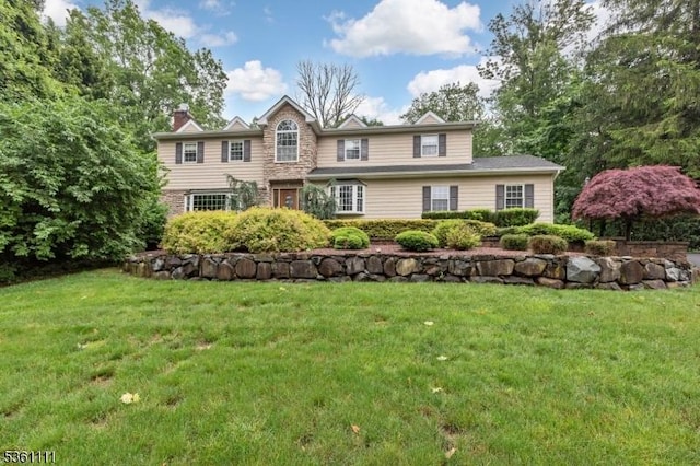 28 Sherbrook Dr, Berkeley Heights Twp, NJ 07922 - view of front of property with a front yard and a chimney