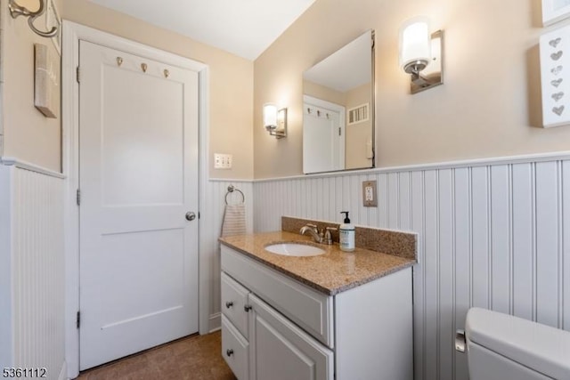 13 Henley Ave, Cranford Twp, NJ 07016 - bathroom with wainscoting, vanity, and toilet