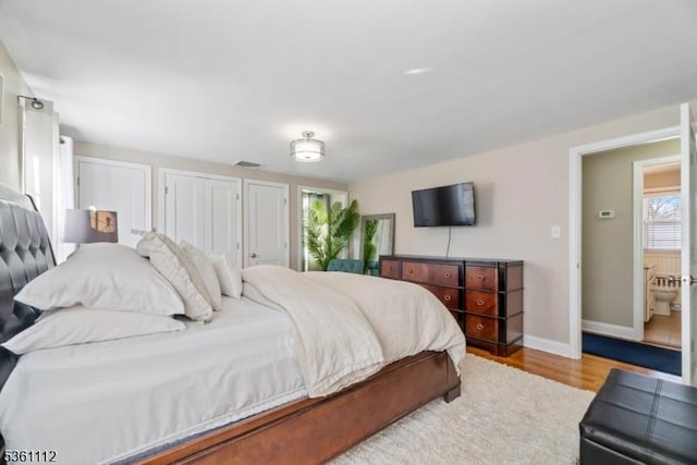 13 Henley Ave, Cranford Twp, NJ 07016 - bedroom with wood finished floors, multiple windows, and baseboards