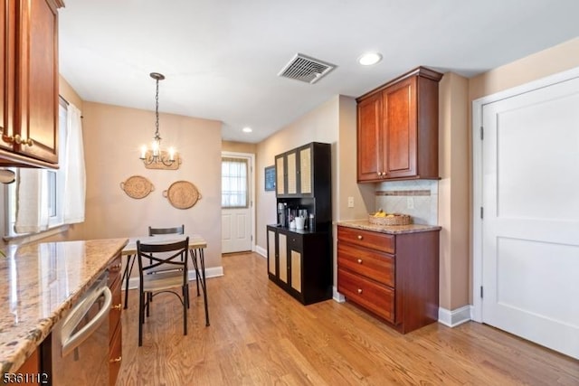 13 Henley Ave, Cranford Twp, NJ 07016 - kitchen with light wood-style flooring, a chandelier, dishwasher, light stone countertops, and recessed lighting