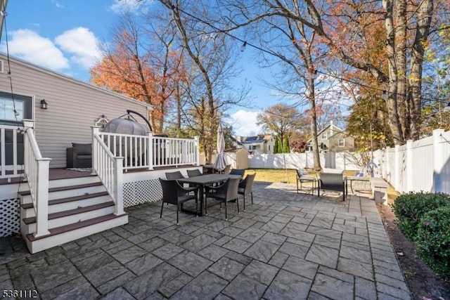 13 Henley Ave, Cranford Twp, NJ 07016 - fenced backyard with outdoor dining space, a wooden deck, and a patio area