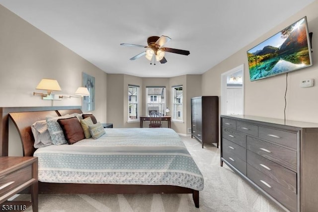 42 Rockcreek Ter Unit 42, Riverdale Boro, NJ 07457 - bedroom with light carpet, ceiling fan, and baseboards