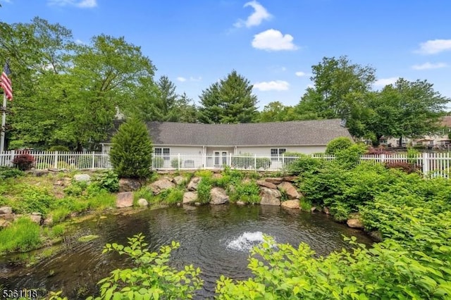 42 Rockcreek Ter Unit 42, Riverdale Boro, NJ 07457 - back of property with a small pond