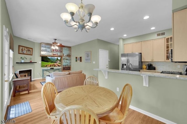 42 Rockcreek Ter Unit 42, Riverdale Boro, NJ 07457 - dining area with a chandelier, light wood-type flooring, ceiling fan, baseboards, and recessed lighting