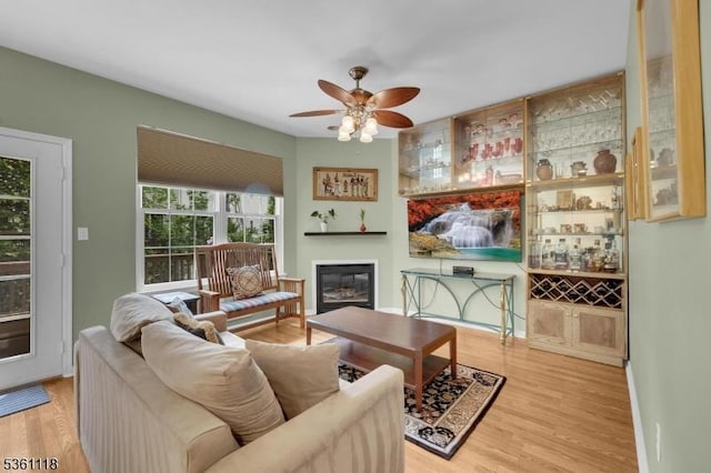 42 Rockcreek Ter Unit 42, Riverdale Boro, NJ 07457 - living area with a ceiling fan, wood finished floors, and a glass covered fireplace