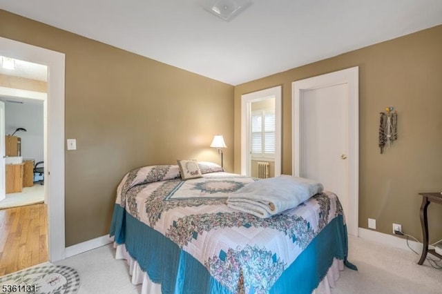 498 Pines Lake Dr, Wayne Twp, NJ 07470 - bedroom featuring radiator, carpet flooring, and baseboards
