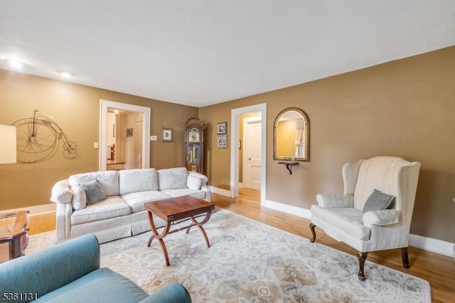 498 Pines Lake Dr, Wayne Twp, NJ 07470 - living room featuring light wood-style floors and baseboards