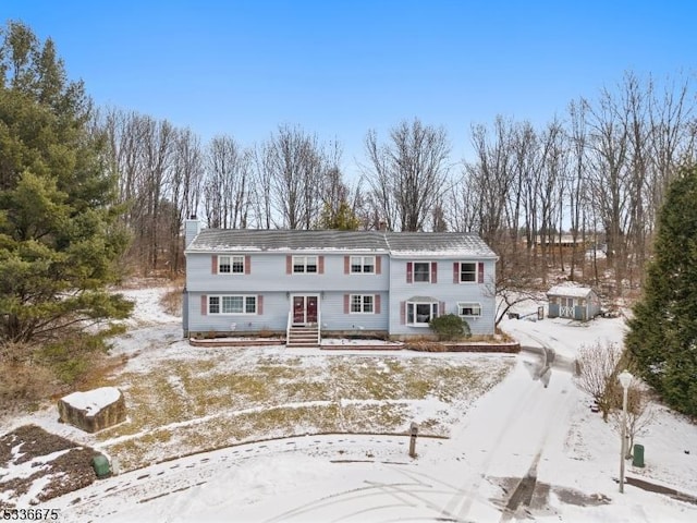6 Cambridge Ct, Mount Olive Twp, NJ 07828 - view of front of property featuring a chimney and view of scattered trees