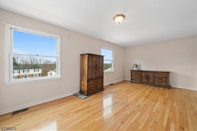 6 Cambridge Ct, Mount Olive Twp, NJ 07828 - unfurnished bedroom with wood-type flooring and baseboards