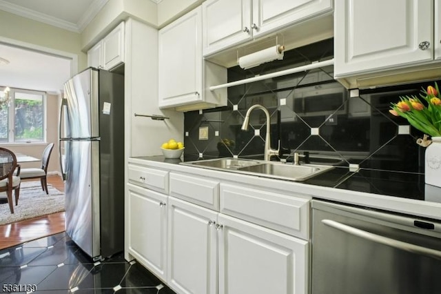 10 Smith Manor Blvd Unit 514, West Orange Twp, NJ 07052 - kitchen with stainless steel appliances, ornamental molding, a sink, white cabinetry, and tasteful backsplash