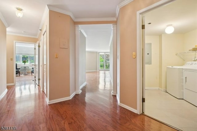 10 Smith Manor Blvd Unit 514, West Orange Twp, NJ 07052 - hallway with independent washer and dryer, electric panel, light wood-style flooring, crown molding, and baseboards