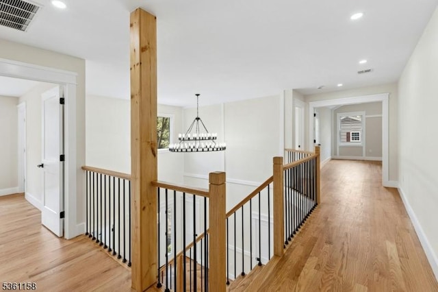 48 Hunterdon Blvd, Berkeley Heights Twp, NJ 07974 - hallway featuring an upstairs landing, light wood finished floors, a chandelier, and recessed lighting