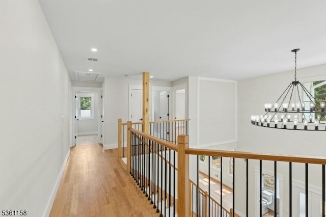 48 Hunterdon Blvd, Berkeley Heights Twp, NJ 07974 - hallway featuring attic access, an upstairs landing, light wood finished floors, a chandelier, and recessed lighting