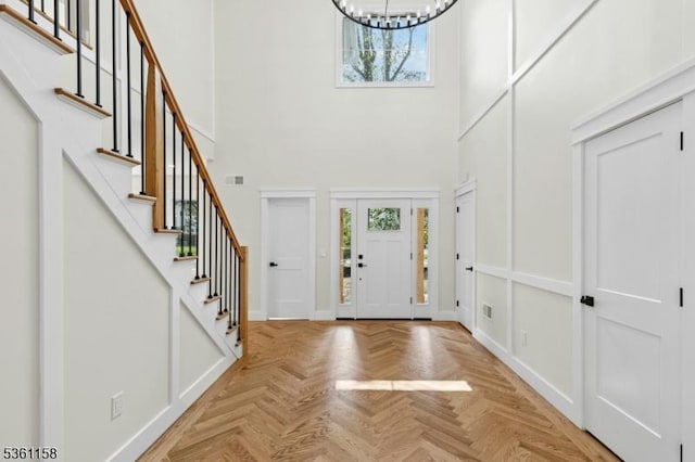 48 Hunterdon Blvd, Berkeley Heights Twp, NJ 07974 - entryway featuring a high ceiling, a chandelier, and stairs