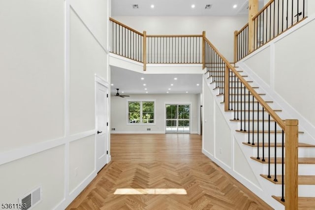 48 Hunterdon Blvd, Berkeley Heights Twp, NJ 07974 - stairs featuring ceiling fan, a towering ceiling, and recessed lighting
