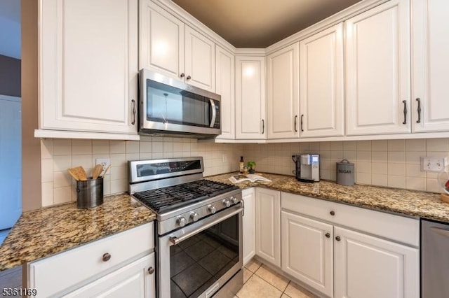 27 Horseshoe Dr, Hillsborough Twp, NJ 08844 - kitchen with appliances with stainless steel finishes, white cabinets, and backsplash