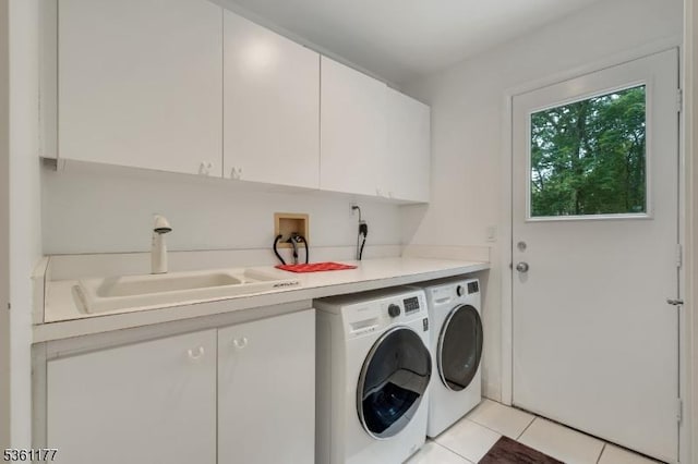 12 Fox Hollow Rd, Montville Twp, NJ 07045 - laundry area featuring washer and dryer, cabinet space, and light tile patterned floors