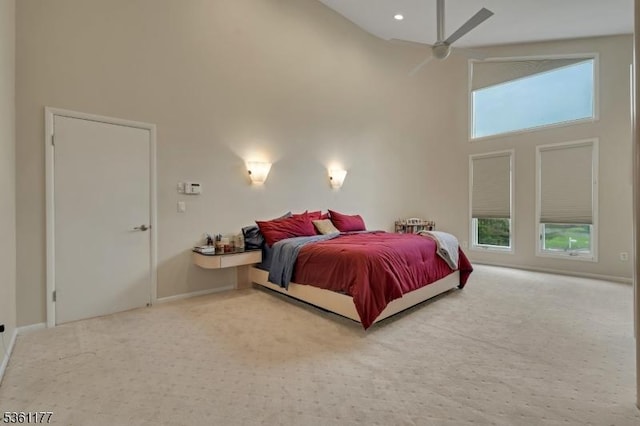12 Fox Hollow Rd, Montville Twp, NJ 07045 - carpeted bedroom featuring a high ceiling, multiple windows, baseboards, and a ceiling fan