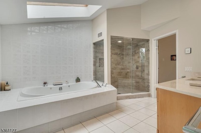 12 Fox Hollow Rd, Montville Twp, NJ 07045 - bathroom featuring a skylight, a bath, tile patterned floors, a shower stall, and vanity