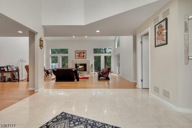 12 Fox Hollow Rd, Montville Twp, NJ 07045 - hallway with recessed lighting, tile patterned floors, a towering ceiling, and baseboards