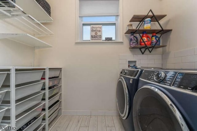 11 Spring Mdw, Oxford Twp, NJ 07863 - laundry room with washing machine and clothes dryer and light wood-type flooring