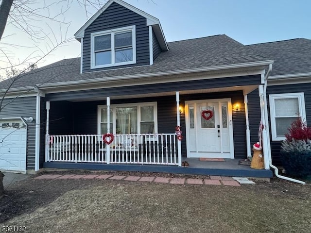 11 Spring Mdw, Oxford Twp, NJ 07863 - view of front of house with covered porch, roof with shingles, and a garage