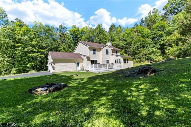 10A E Crisman Rd, Blairstown Twp, NJ 07825 - back of property featuring a lawn and a view of trees
