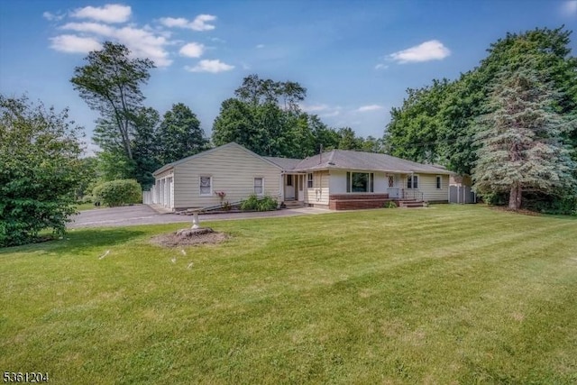 260 Munsonhurst Rd, Franklin Boro, NJ 07416 - rear view of house featuring a yard