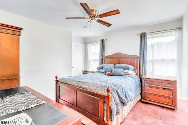 24 Higgins Rd, Old Bridge Twp, NJ 08857 - bedroom featuring light carpet and a ceiling fan