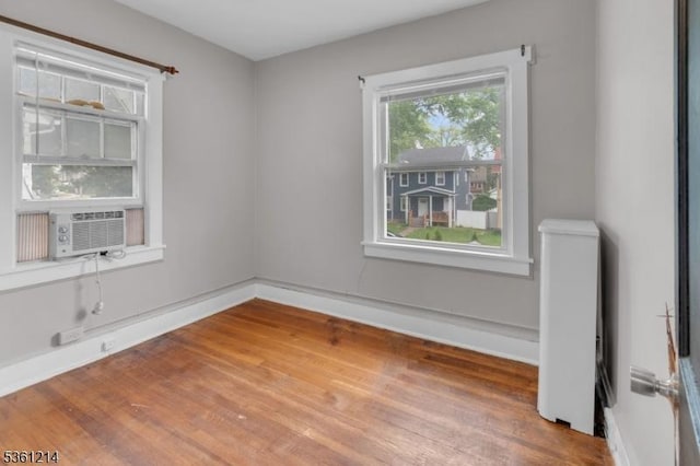 53 Elliot Pl, East Orange City, NJ 07018 - spare room featuring wood finished floors and cooling unit