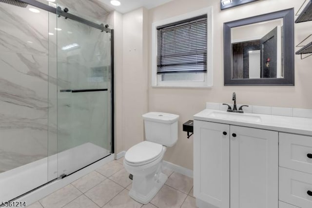 53 Elliot Pl, East Orange City, NJ 07018 - bathroom with toilet, vanity, a marble finish shower, tile patterned floors, and baseboards