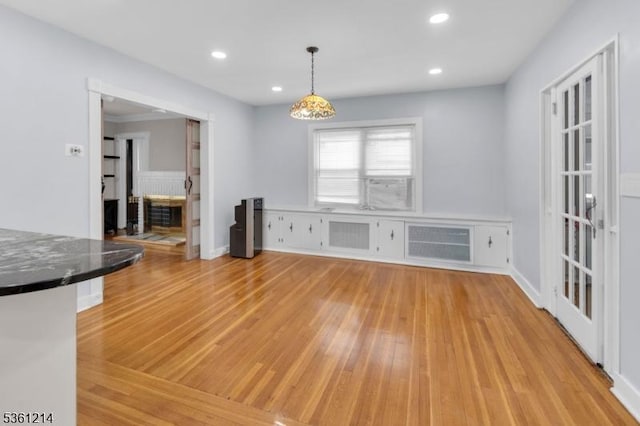 53 Elliot Pl, East Orange City, NJ 07018 - unfurnished dining area with light wood-type flooring, recessed lighting, and a wall mounted AC