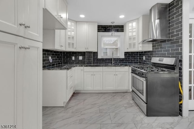 53 Elliot Pl, East Orange City, NJ 07018 - kitchen with stainless steel gas range, wall chimney range hood, light marble finish flooring, glass insert cabinets, and recessed lighting