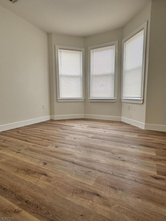 50 Willoughby St, Newark City, NJ 07112 - unfurnished room with wood finished floors and baseboards