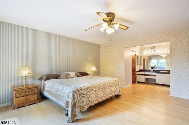 14 Highpoint Unit 14, Cedar Grove Twp, NJ 07009 - bedroom featuring wallpapered walls, light wood finished floors, and a ceiling fan