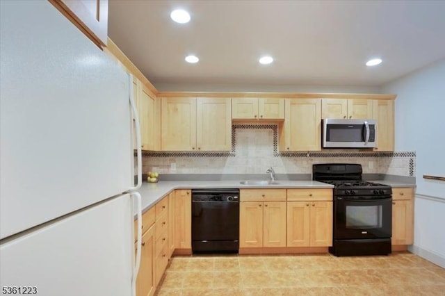14 Highpoint Unit 14, Cedar Grove Twp, NJ 07009 - kitchen with black appliances, light brown cabinets, a sink, backsplash, and light countertops