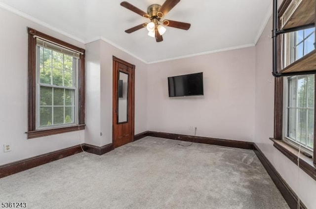 126 Park Ave, Lopatcong Twp, NJ 08865 - carpeted empty room featuring healthy amount of natural light, baseboards, crown molding, and ceiling fan