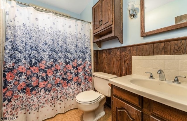 126 Park Ave, Lopatcong Twp, NJ 08865 - bathroom featuring toilet, vanity, a wainscoted wall, and a shower with curtain