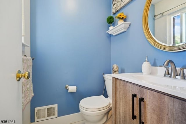 665F Dover Ct, Hillsborough Twp, NJ 08844 - half bathroom with toilet, vanity, and baseboards