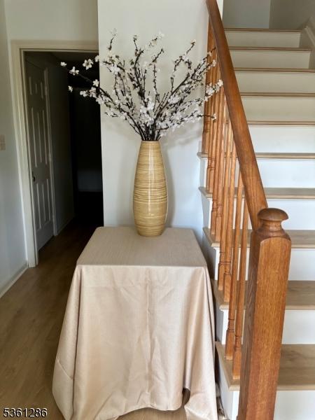 123 Pinehurst Dr, Washington Twp, NJ 07882 - staircase featuring wood finished floors