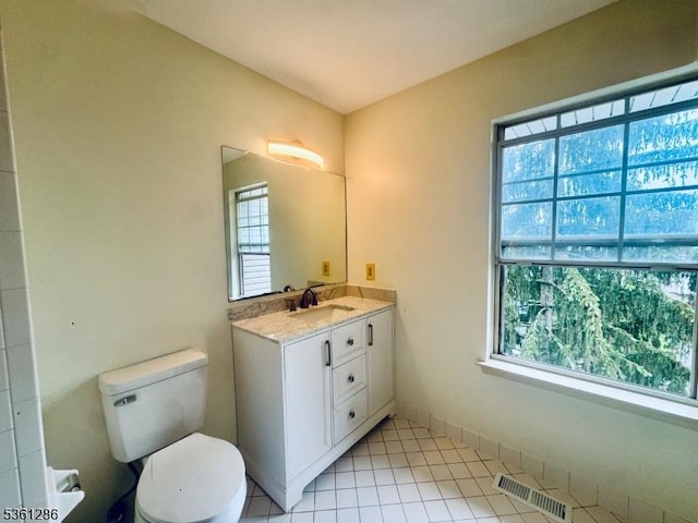 123 Pinehurst Dr, Washington Twp, NJ 07882 - bathroom with toilet, plenty of natural light, vanity, and tile patterned flooring