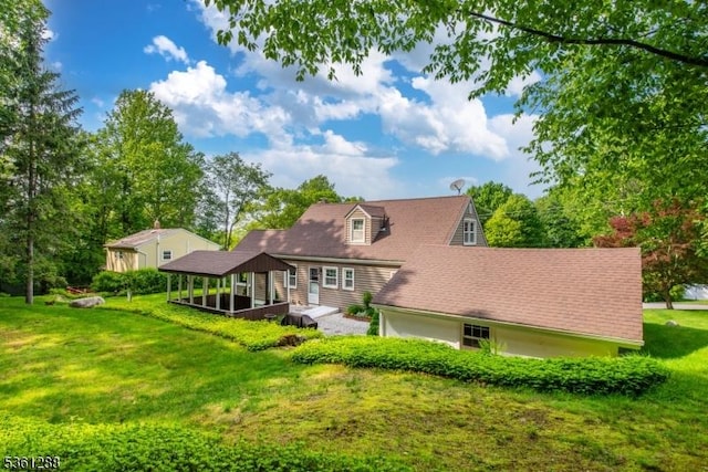 24 W Windy Bush Ln, Sparta Twp, NJ 07871 - back of property with a lawn