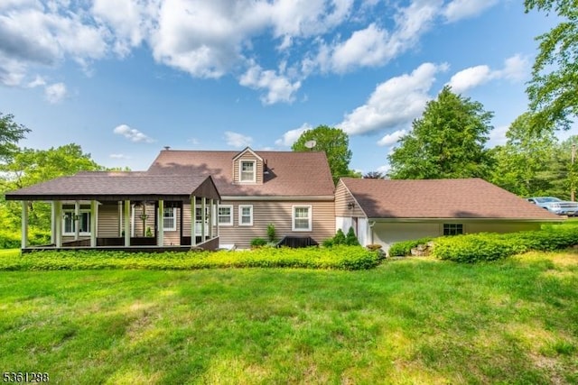 24 W Windy Bush Ln, Sparta Twp, NJ 07871 - rear view of property featuring a lawn