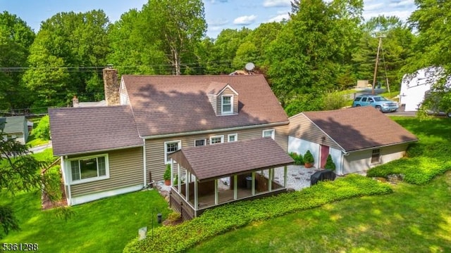 24 W Windy Bush Ln, Sparta Twp, NJ 07871 - rear view of property featuring a chimney and a lawn