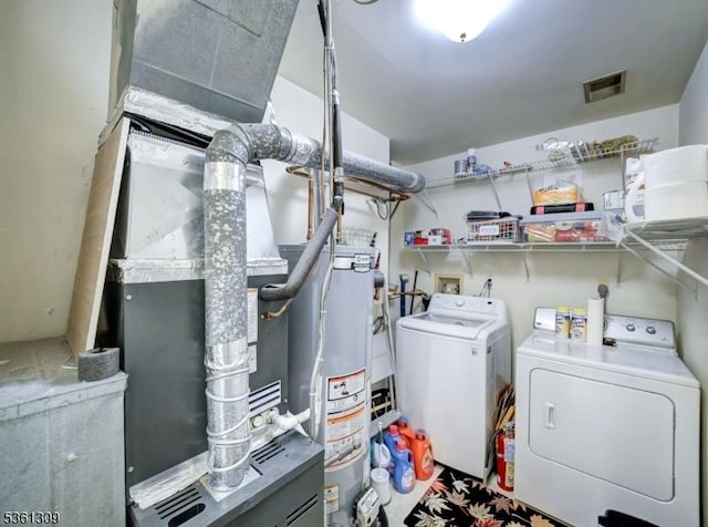 1605 Breckenridge Dr, Branchburg Twp, NJ 08876 - washroom featuring washing machine and clothes dryer and gas water heater