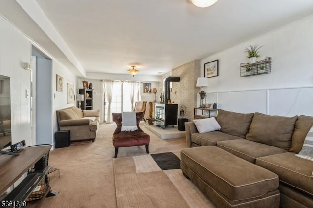 1 Hollywood Dr, Woodbridge Twp, NJ 07095 - living room featuring a wood stove and light carpet