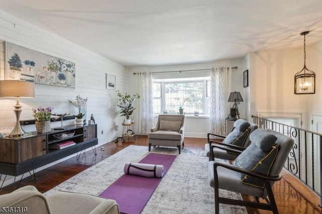 1 Hollywood Dr, Woodbridge Twp, NJ 07095 - living area featuring wood finished floors, a chandelier, and baseboards
