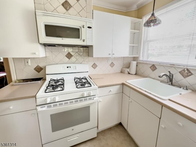51 Minnehaha Blvd, Parsippany-Troy Hills Twp, NJ 07034 - kitchen with white appliances, a sink, crown molding, light countertops, and decorative backsplash