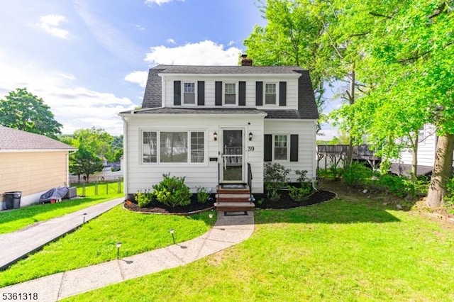 39 Johnson Rd, West Orange Twp, NJ 07052 - colonial inspired home featuring a chimney and roof with shingles